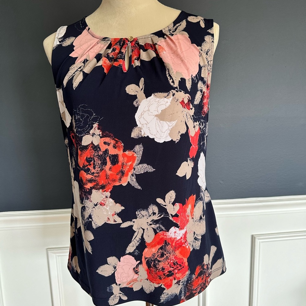 Women’s Tahari sleeveless blouse. Colors navy, red, and white)